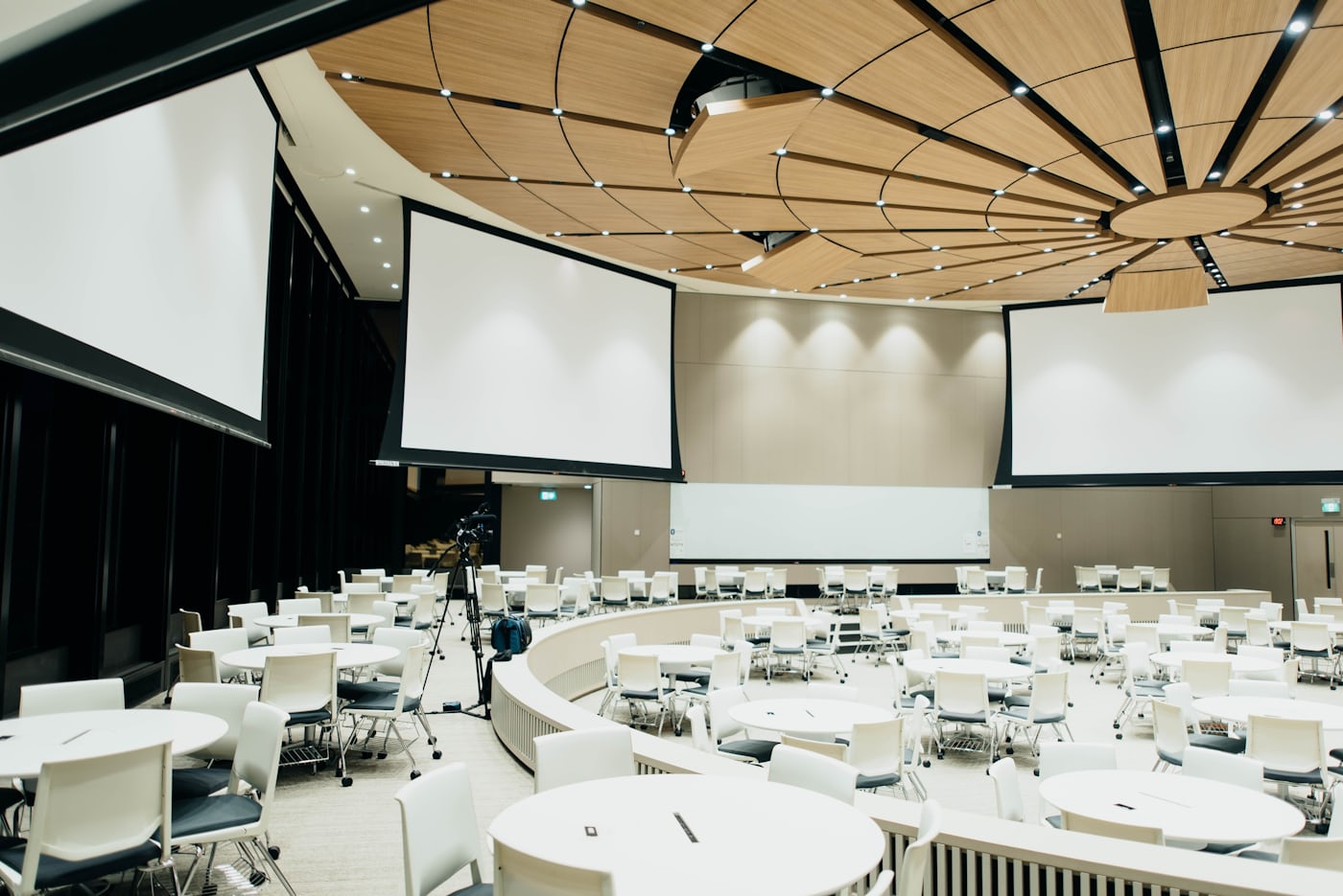 The summit room set with round tables